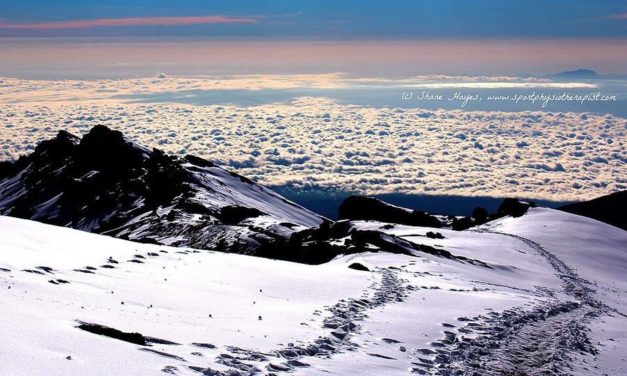 Fresh Tracks above the Clouds on a Fresh Morning - Be careful you don't walk off the cliff